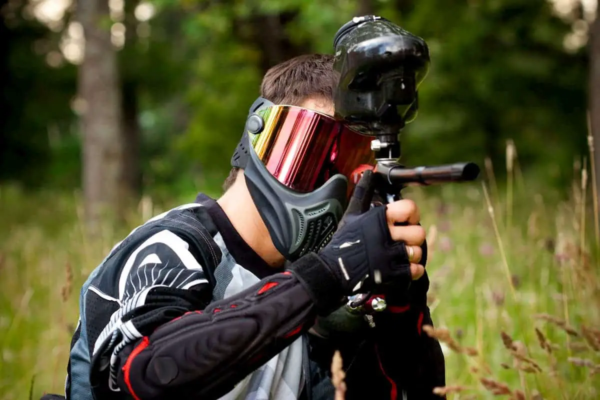 Paintball shooter in the field - What Do You Wear to go Paintballing