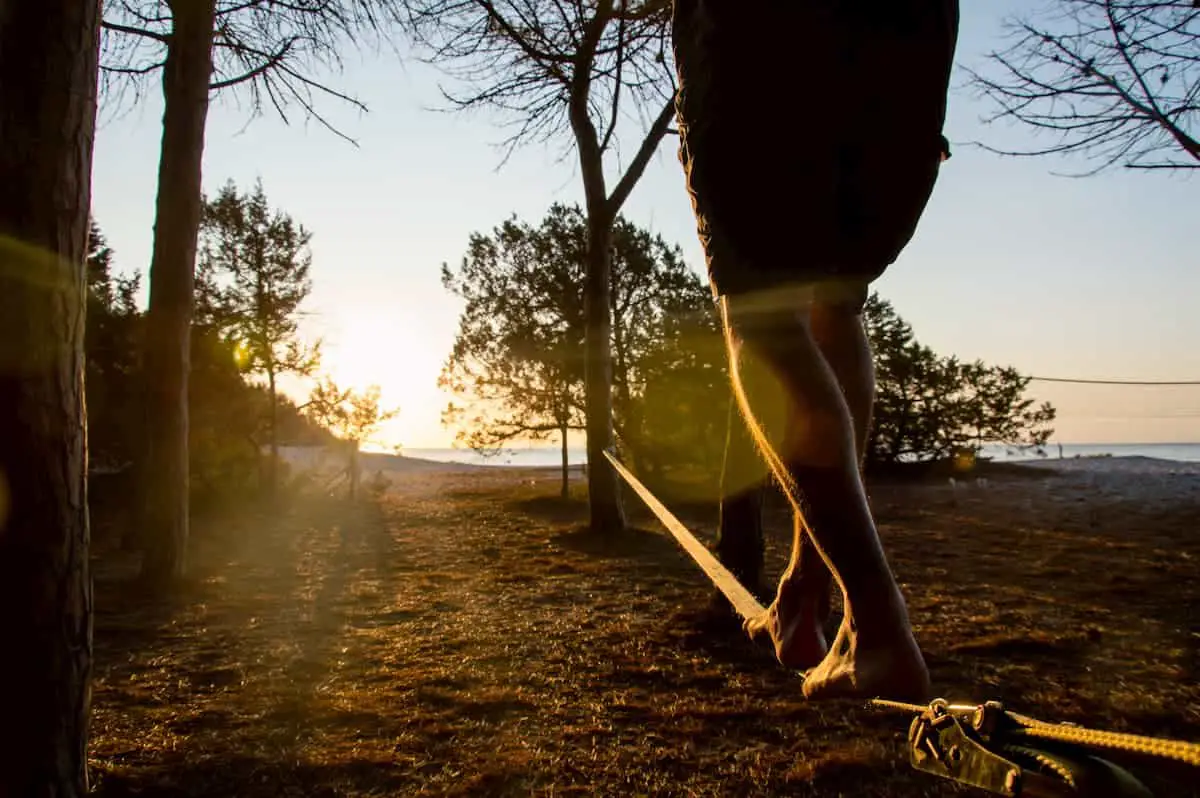 Slackline in backlight - Where Did Slacklining Originate